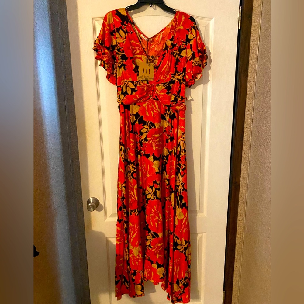 Abel the label beautiful flowy dress. New with tags